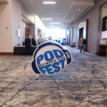 Overcoming My Fear of Flying: My Experience at Podfest 2023